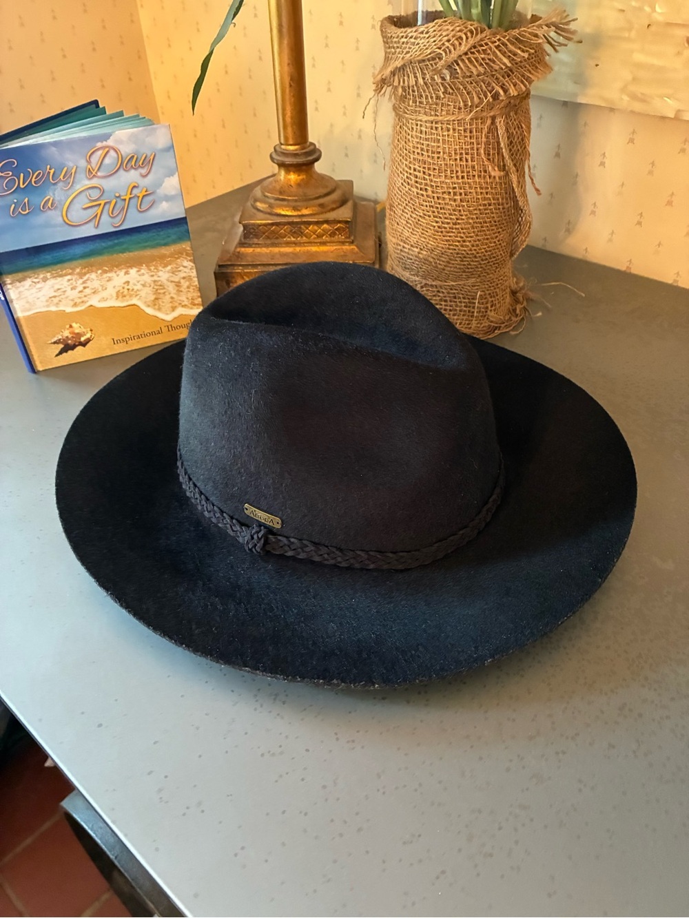 Women’s ADORA 100 percent felt brim hat. BLACK with braided band.